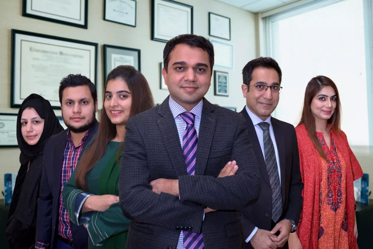 group pictur of best psychiatrists in lahore in a room on standing position